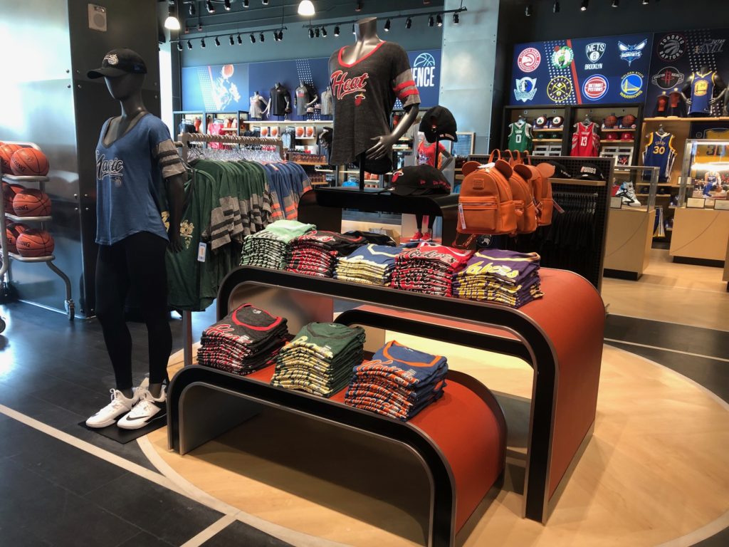 Disney NBA store retail clothing display shelves