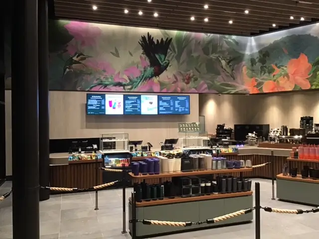 Order queue merchandise displays and decorative wall